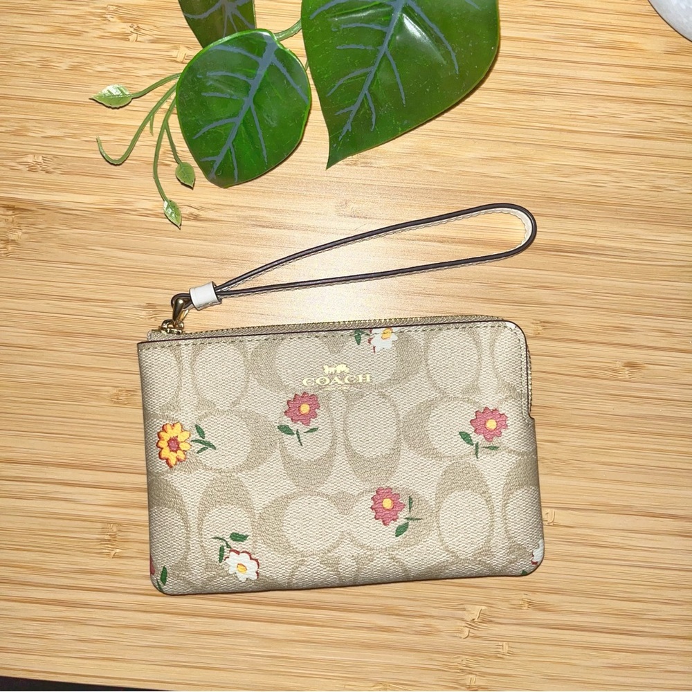 Coach Corner Zip Wristlet In Signature Canvas: Flower Print